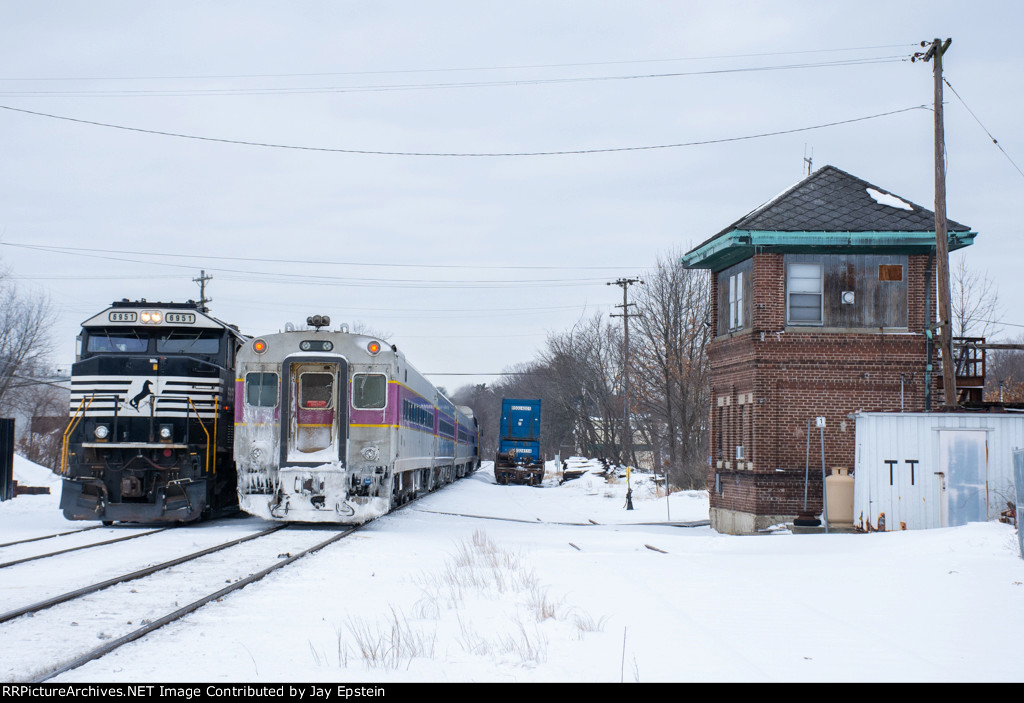 An outbound passes ED-8 next to Ayer tower